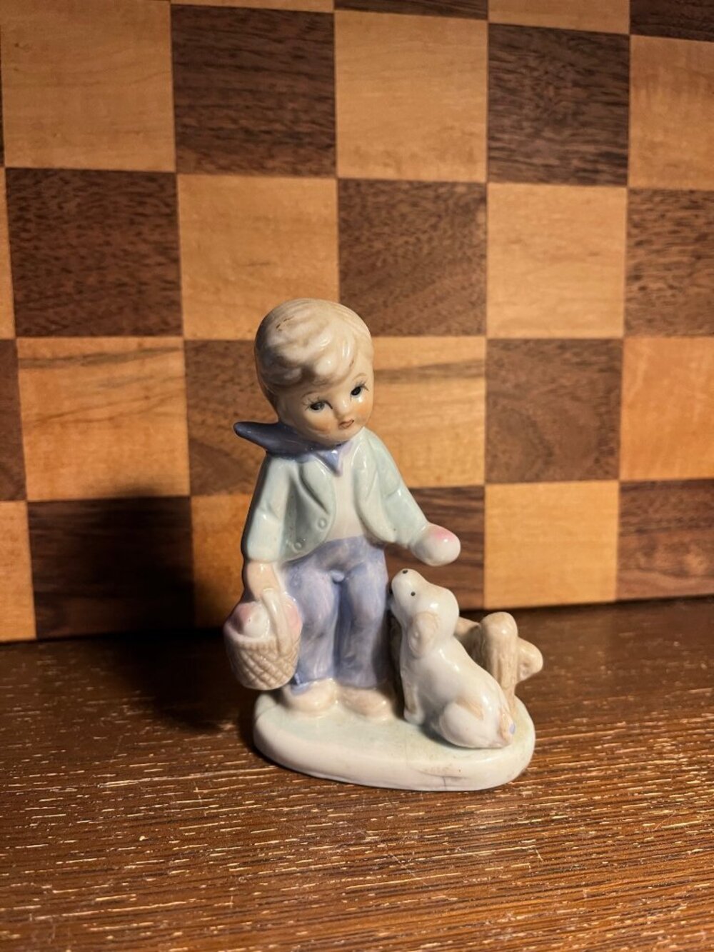 Kowa Style Porcelain Boy with Apple Basket and Dog Figurine, some small cracks a